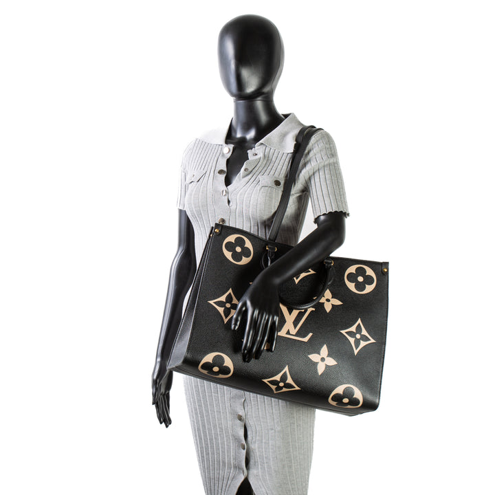 Louis Vuitton Monogram Empreinte Bicolor Onthego GM - Negro/Crema