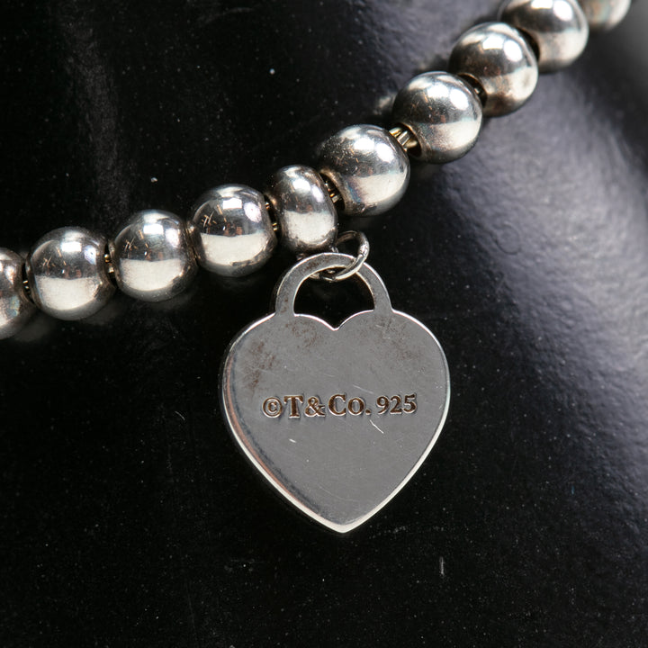 Tiffany & Co. Pulsera de cuentas de etiqueta de corazón - Venta final